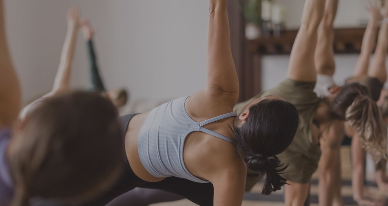 Group stretching class in a studio